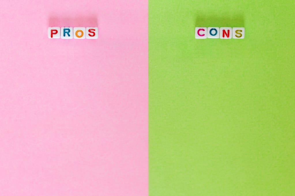 The Pros and Cons of Renting vs. Buying a Home:.Pros and Cons, blank paper with different colours to write positives and negatives
