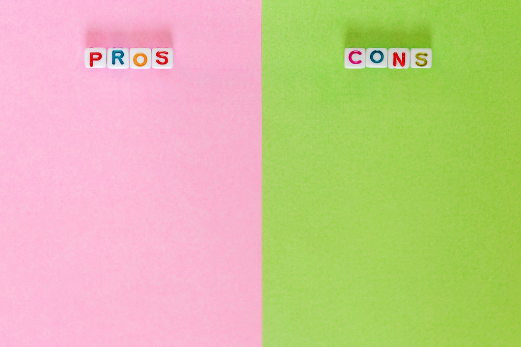 The Pros and Cons of Renting vs. Buying a Home:.Pros and Cons, blank paper with different colours to write positives and negatives